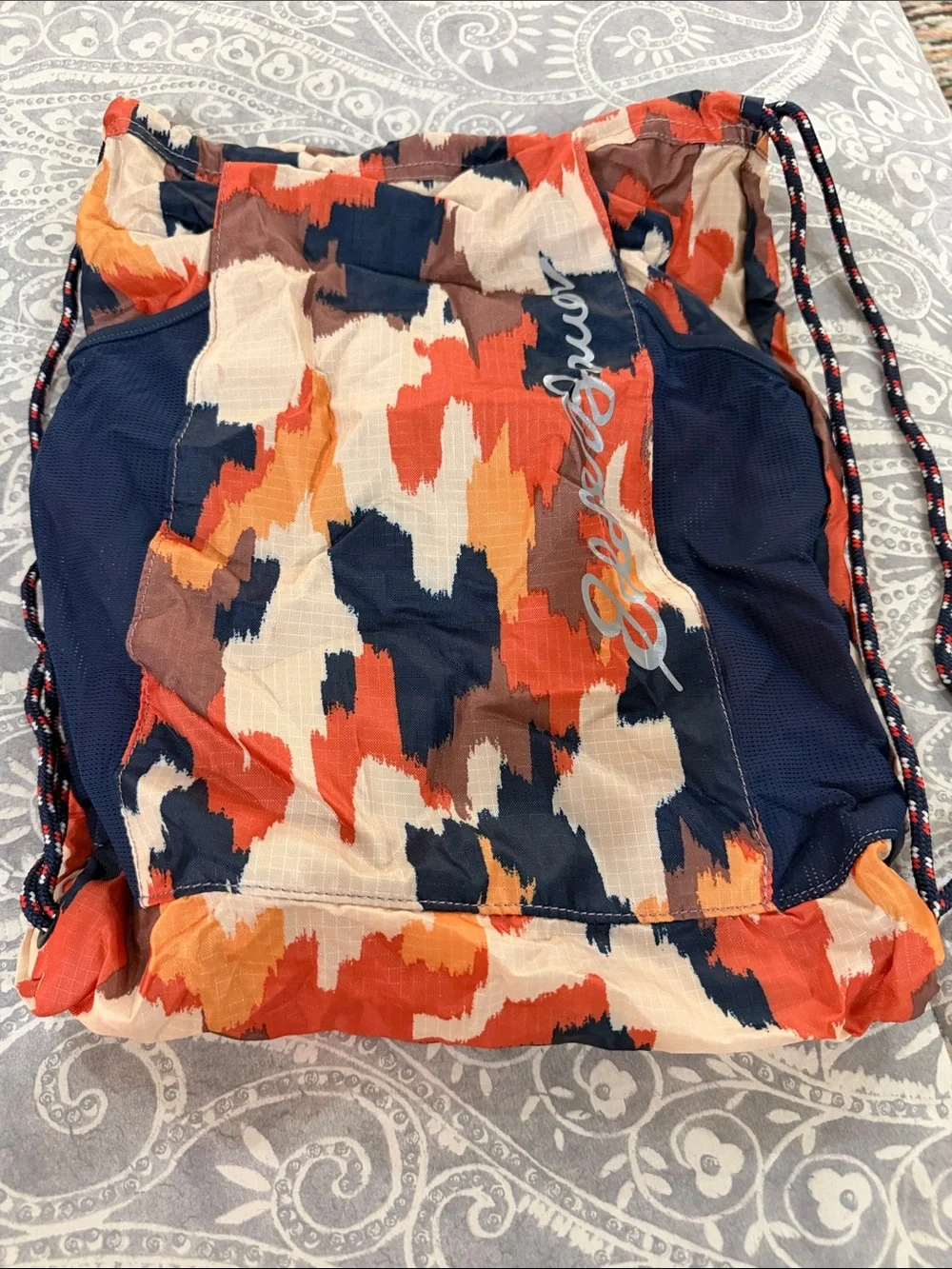 Eddie Bauer Navy, Cream and Orange Brushstroke Stowaway Pack